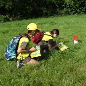 Brownies orienteering, following the clues and using a compass.