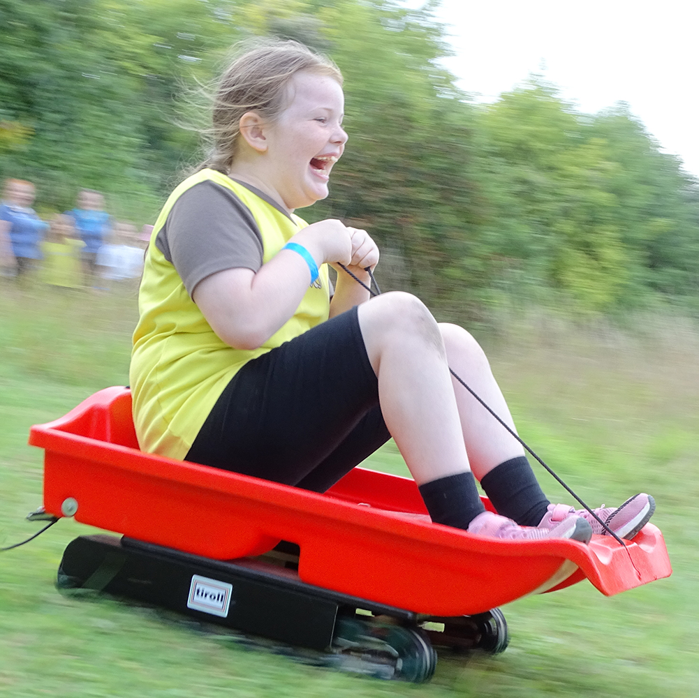 Grass sledging at BeWILDer, Mystole.